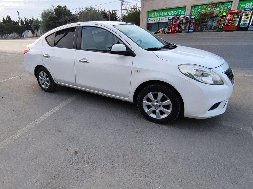 Nissan Sunny: 1.5 l | 2014 il Sedan