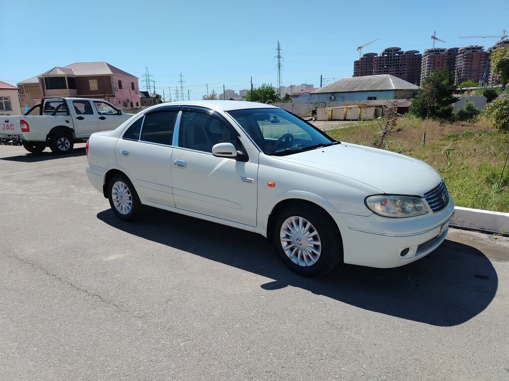 Nissan Sunny: 1.6 l | 2008 il Sedan Mərəzə